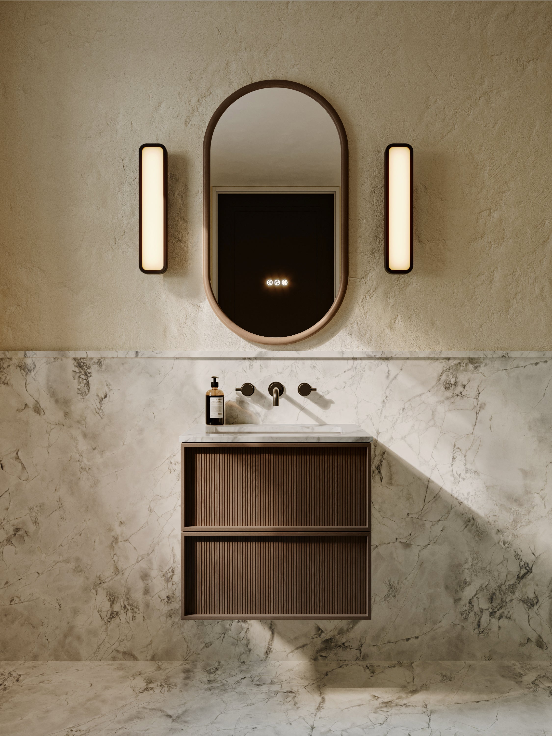 Bathroom vanity with mirror, lights, and sink against a marble wall.